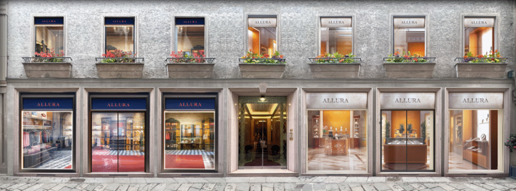 Storefront displays clothing and accessories as pedestrians walk by. Signs read "ALLURA," reflecting an upscale retail environment.